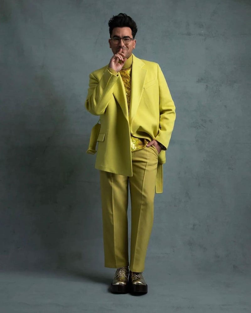 'Schitt's Creek' star Dan Levy wears yellow Valentino to attend the 78th annual Golden Globe Awards from home on February 28, 2021. Instagram