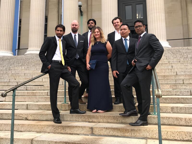 The Reuters Pulitzer Prize winning photography team of (L-R) Adnan Abidi, Cathal McNaughton, Danish Siddiqui, Hannah McKay, Damir Sagolj, Soe Zeya Tun and Mohammad Ponir Hossain pose for a photo. Reuters