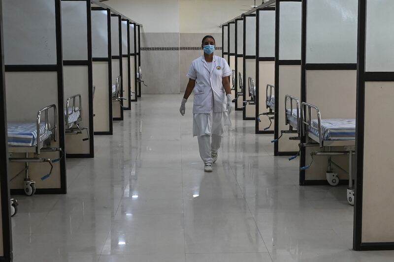 A nurse at an isolation ward arranged for Covid-19 patients arriving from high-risk destinations at a hospital in Chennai. Healthcare sector spending in India is expected to more than double from 2017’s figure to $372 billion this year. AFP