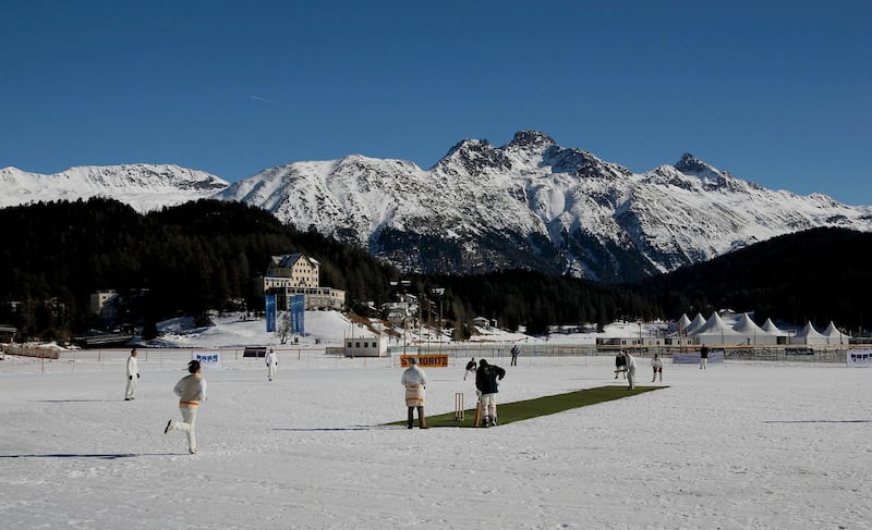 ST. MORITZ, SWITZERLAND - FEBRUARY 02: (EDITOR'S NOTE: AN ON-CAMERA POLARIZING FILTER WAS USED TO CREATE THIS IMAGE)  Winterthur XI play Old Salopians XI during the 19th Cricket Tournament on Ice held on the frozen surface of Lake St. Moritz on February 2, 2007 in St. Moritz, Switzerland. The tournament first took place in 1988, when a group of Britons challenged the students of the international boarding school Lyceum Alpinum Zuoz to a game. Since then it has become an integral part of the cricket calendar, attracting international players and high-flying businessmen from all over the world. (Photo by Scott Barbour/Getty Images)