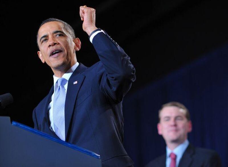 The US president Barack Obama, speaking at a fundraiser for Senator Michael Bennet, right, said that the country is over the worst of the crisis.
