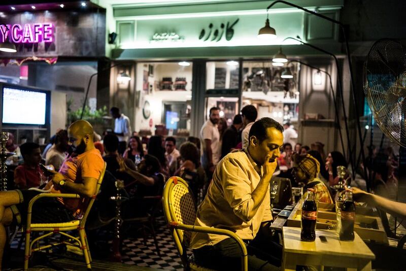 Packed with diners having drinks and smoking shisha, Kazouza attracts patrons who are there to enjoy the atmosphere as much as the food. David Degner for The National