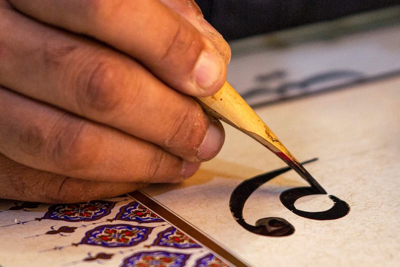 Arabic calligraphy is the latest addition from the UAE, among other countries, to Unesco's intangible cultural heritage lists. AFP