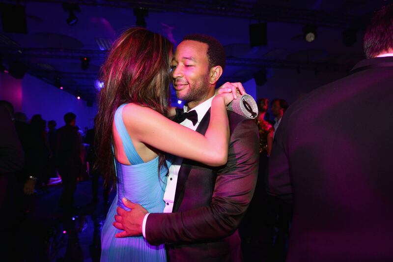 The couple attend amfAR Milano 2011 at La Permanente on September 23, 2011 in Milan, Italy. Getty Images