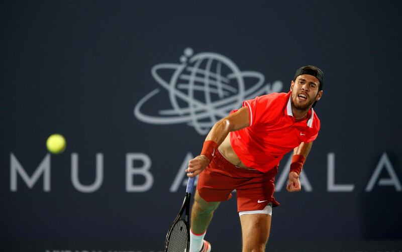 epa07250462 Karen Khachanov of Russia in action during his match against Dominic Thiem of Austria  at the Mubadala World Tennis Championship 2018 in Abu Dhabi, United Arab Emirates, 27 December 2018.  EPA/ALI HAIDER