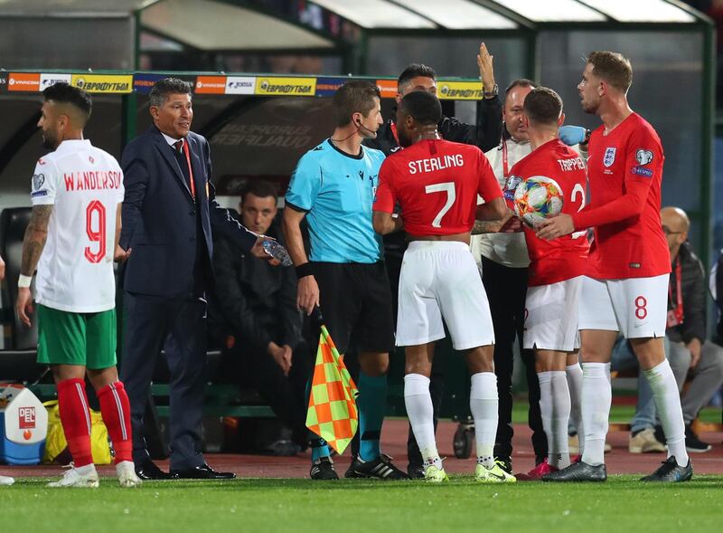 SOFIA, BULGARIA - OCTOBER 14: Raheem Sterling, Kieran Trippier and Jordan Henderson speak with Krasimir Balakov manager of Bulgaria during the UEFA Euro 2020 qualifier between Bulgaria and England on October 14, 2019 in Sofia, Bulgaria. (Photo by Catherine Ivill/Getty Images)