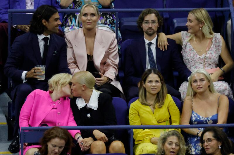 Actreess Rebel Wilson kisses girlfriend Ramona Agruma while sitting in a box with Lindsey Vonn and boyfriend Diego Osorio. Reuters