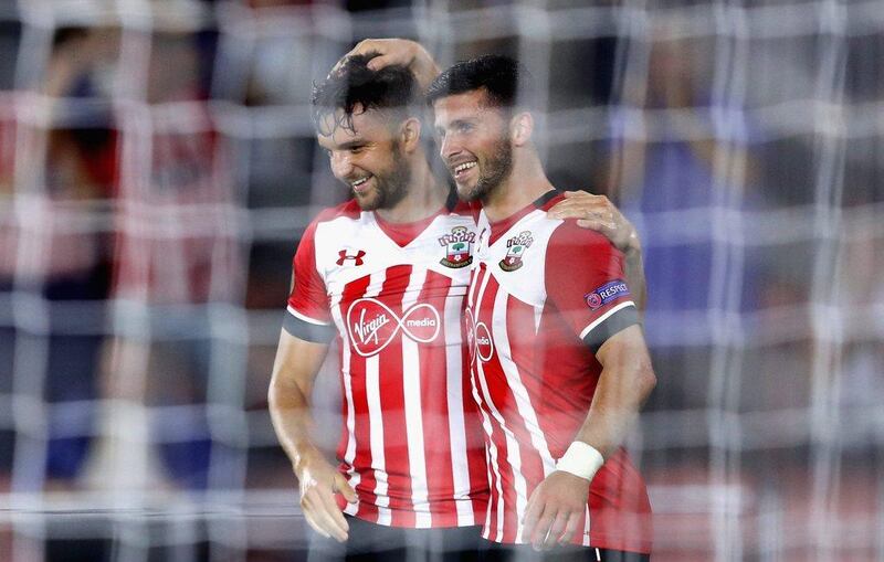 Jay Rodriguez of Southampton is congratulated by Shane Long after scoring their third goal. Warren Little / Getty Images