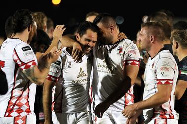 Players of Abu Dhabi Harlequins celebrating after winning the UAE Premiership final against Dubai Exiles at The Sevens rugby stadium in Dubai.  Abu Dhabi Harlequins beat Dubai Exiles by 34-28. Pawan Singh / The National  