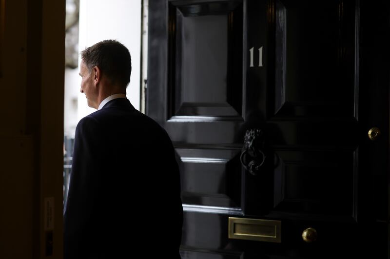 Mr Hunt leaves to present the budget. Photo: No 10 Downing Street