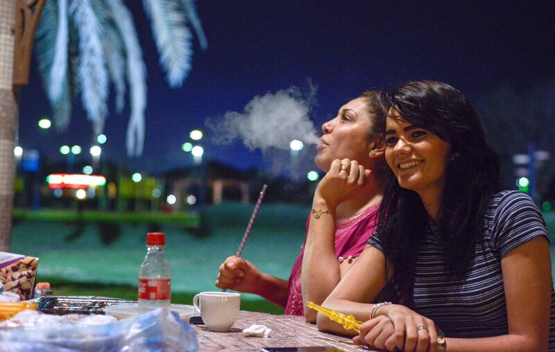 Abu Dhabi, United Arab Emirates - Left, Olfa Baraker, 37, and Abir Abidi, 26, hang out at Family Park, opposite the Corniche during Ramadan season on May 19, 2018. (Khushnum Bhandari/ The National)
