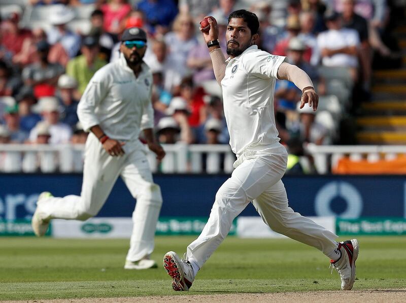 India's Umesh Yadav (R) fields the ball on the first day of the first Test cricket match between England and India at Edgbaston in Birmingham, central England on August 1, 2018. / AFP PHOTO / ADRIAN DENNIS / RESTRICTED TO EDITORIAL USE. NO ASSOCIATION WITH DIRECT COMPETITOR OF SPONSOR, PARTNER, OR SUPPLIER OF THE ECB