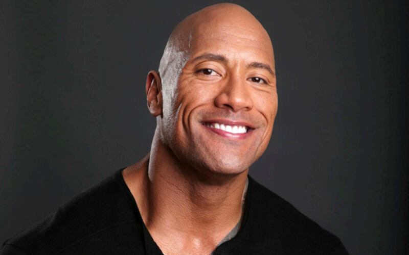 FILE - This March 23, 2013 file photo shows actor Dwayne Johnson posing for a portrait at the Four Seasons in Los Angeles. Johnson also hosts "The Hero," competition series on TNT.  The season finale airs Thursday, Aug. 1. (Photo by Eric Charbonneau/Invision/AP, File)