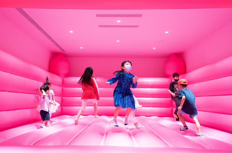 8. Children play at the Museum of Ice Cream, one of many attractions that make Singapore a good pick for family trips.  EPA