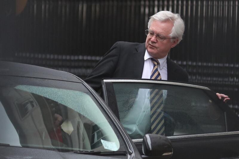 Britain's Secretary of State for Exiting the European Union (Brexit Minister) David Davis gets in a car in Downing Street, in central London on January 29, 2018. / AFP PHOTO / Daniel LEAL-OLIVAS