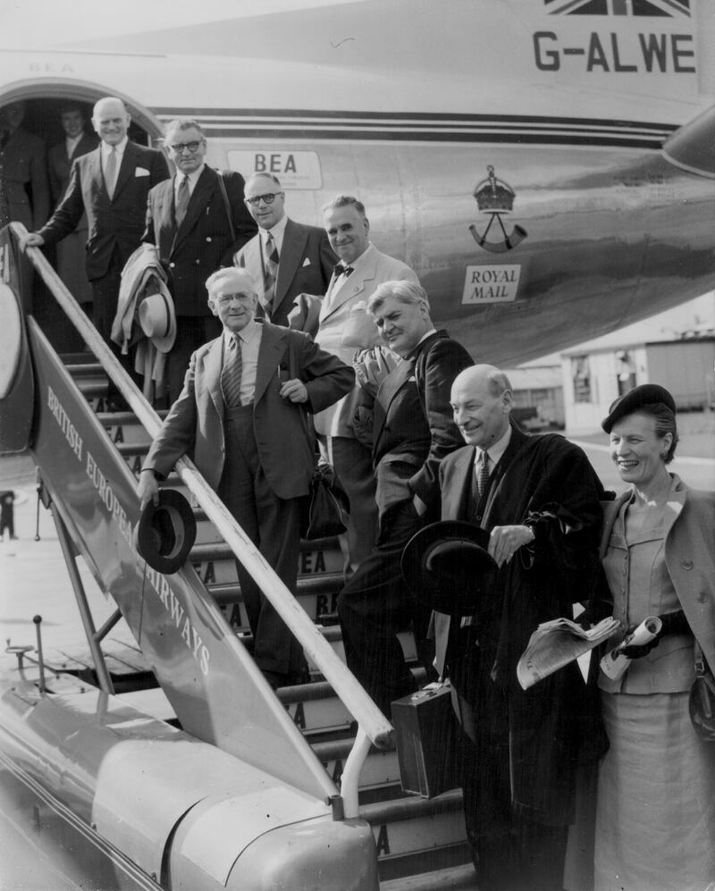 Party leader Clement Attlee with a Labour delegation, boarding a plane on their way to China in 1954