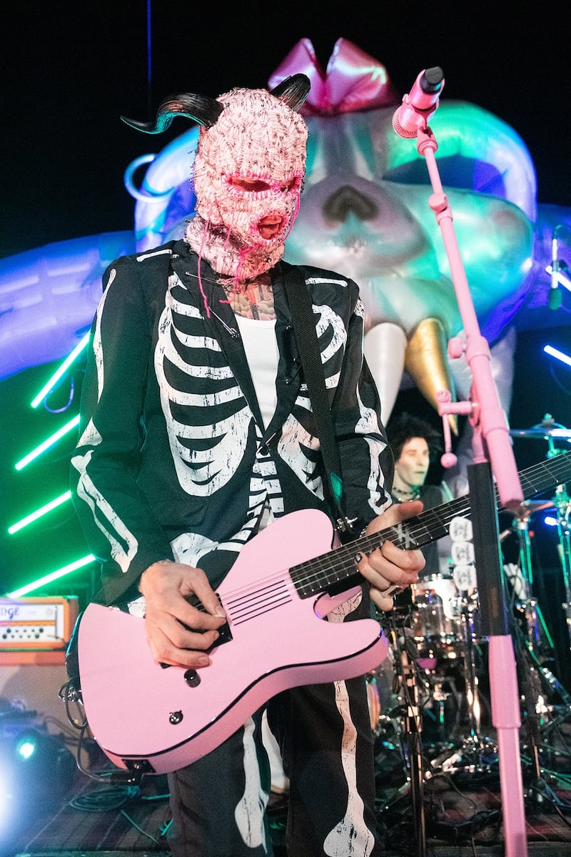 Machine Gun Kelly donned a skeleton suit and creepy mask