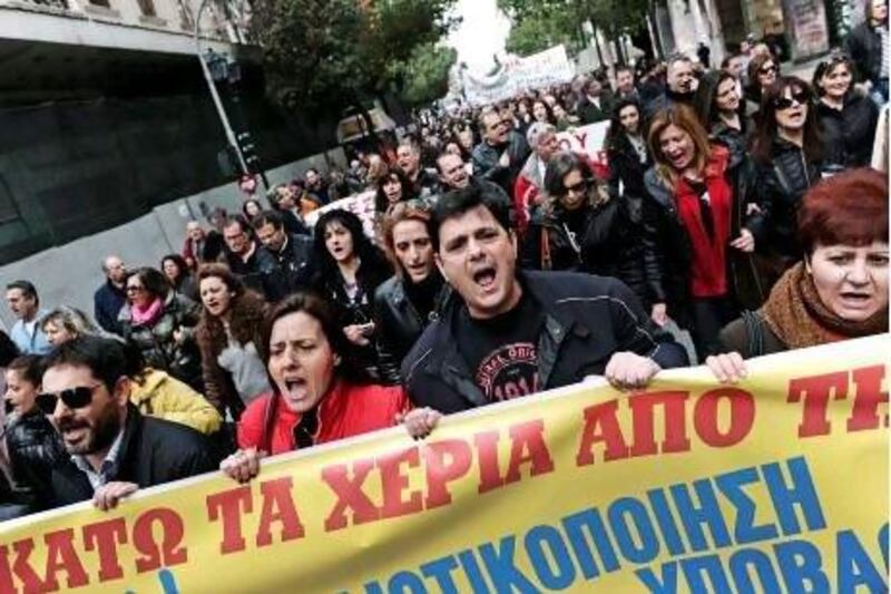 Greek health workers demonstrate in Athens against the government's austerity measures. Aris Messinis / AFP