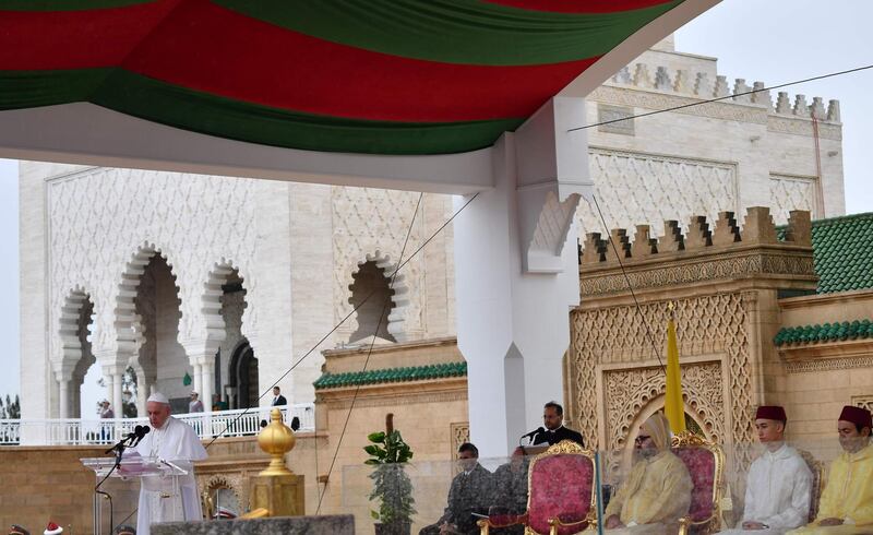 Pope Francis, left, delivers a speech as King Mohammed VI of Morocco, third right, listens in Rabat. AFP