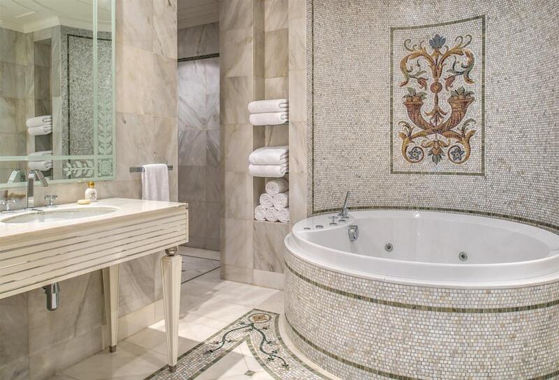 Patterns and designs made famous in the fashion collections on Versace's Runways were used throughout the interiors, including the bathroom. Courtesy Palazzo Versace