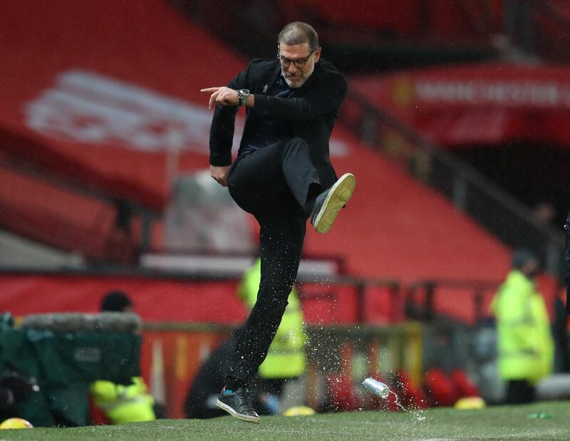 West Bromwich Albion manager Slaven Bilic kicks a can of drink. Reuters