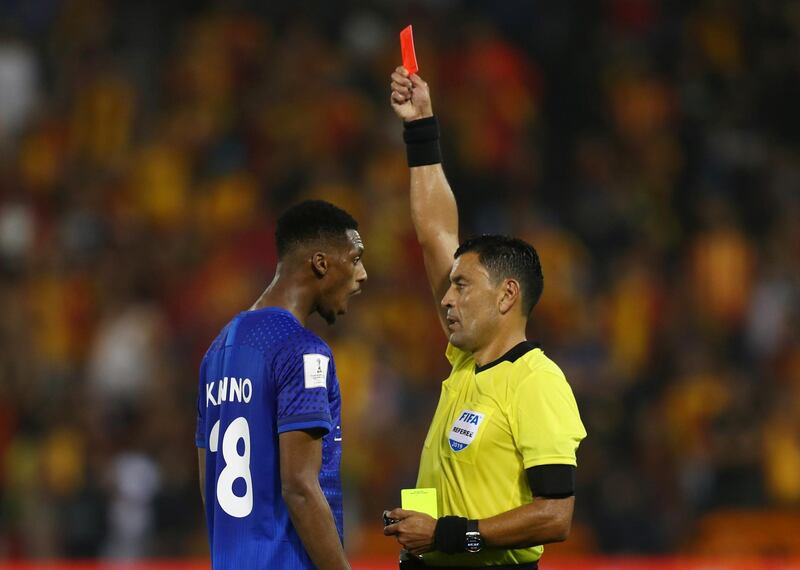 Al Hilal's Mohamed Kanno is shown a red card by referee Roberto Tobar. Reuters