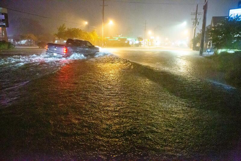 Flooding in Slidell, Louisiana, makes driving treacherous. AP