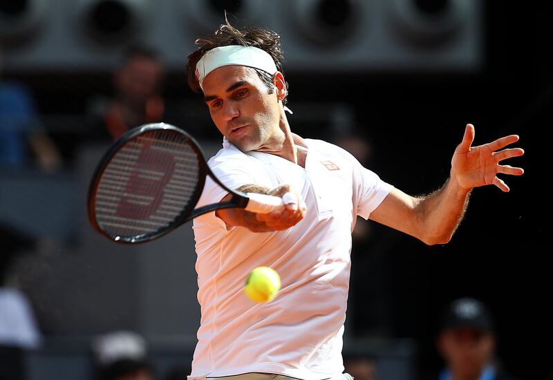 MADRID, SPAIN - MAY 09:  Roger Federer of Switzerland in action against Gael Monfils of France during day six of the Mutua Madrid Open at La Caja Magica on May 09, 2019 in Madrid, Spain. (Photo by Julian Finney/Getty Images)