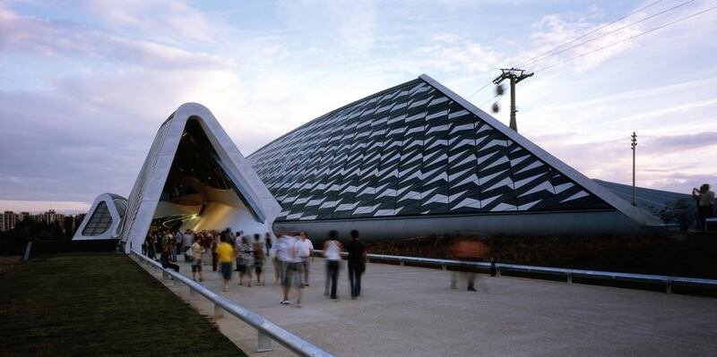 People enter the Zaragoza Expo 2008 in Spain through the bridge pavilion designed by Zaha Hadid. View Pictures / UIG via Getty Images