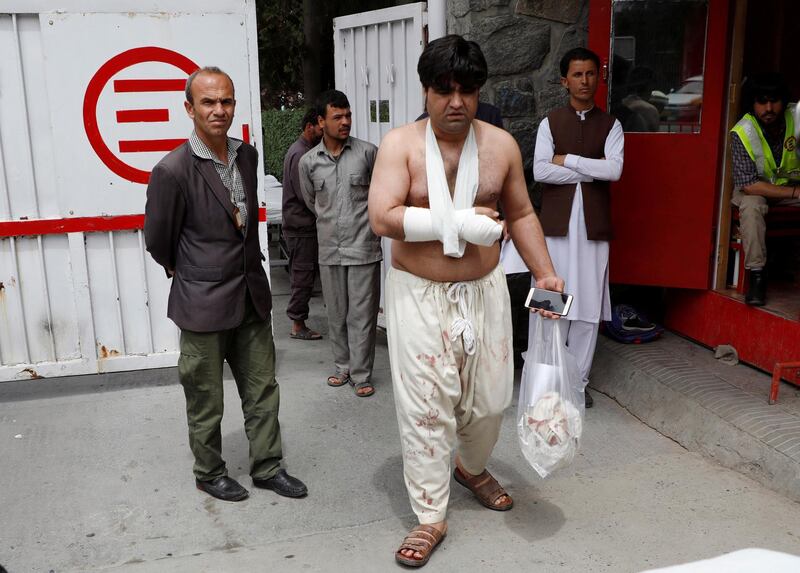 A man injured in a blast leaves a hospital after treatment in Kabul, Afghanistan. REUTERS