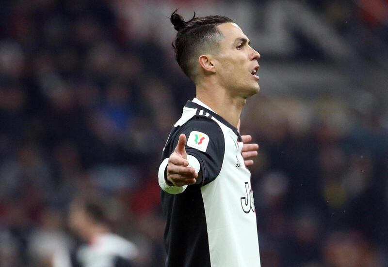 epa08329337 (FILE) -  Juventus' Cristiano Ronaldo celebrates scoring the equalizer from the penalty spot during the first leg of the Coppa Italia semi final soccer match between AC Milan and Juventus at Giuseppe Meazza stadium in Milan, Italy, 13 February 2020 (reissued on 28 March 2020). On 28 March 2020 Juventus FC announced, amid the COVID-19  coronavirus crisis, to have 'reached an understanding with players and coach of the First Team for the reduction of their compensation for an amount equal to the monthly payments of March, April, May and June 2020'.  EPA/MATTEO BAZZI