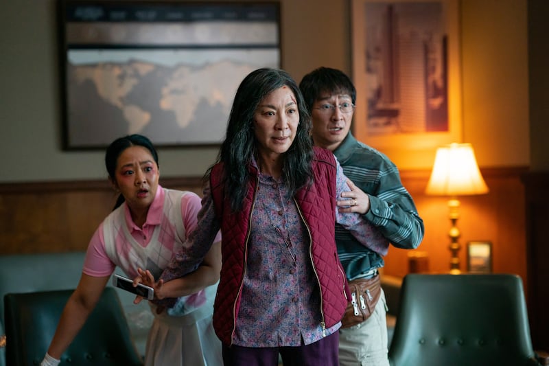 Stephanie Hsu, Yeoh and Ke Huy Quan in the absurdist comedy Everything Everywhere All at Once. Photo: A24 