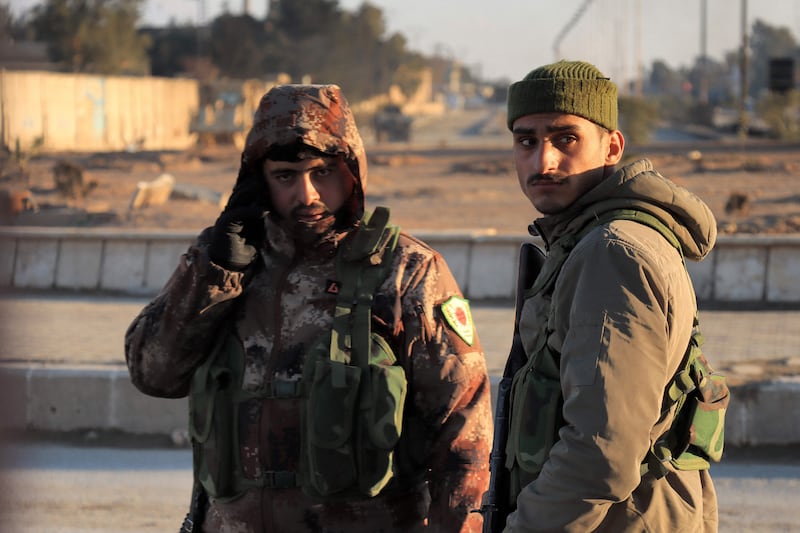 Members of the Syrian Democratic Forces patrol Ghwayran prison in Hasakeh. AFP