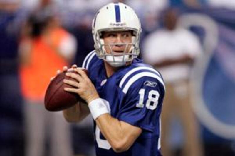 Indianapolis Colts quarterback Peyton Manning drops back to pass during the first quarter of an NFL preseason football game against the Philadelphia Eagles in Indianapolis, Thursday, Aug. 20, 2009. (AP Photo/AJ Mast)