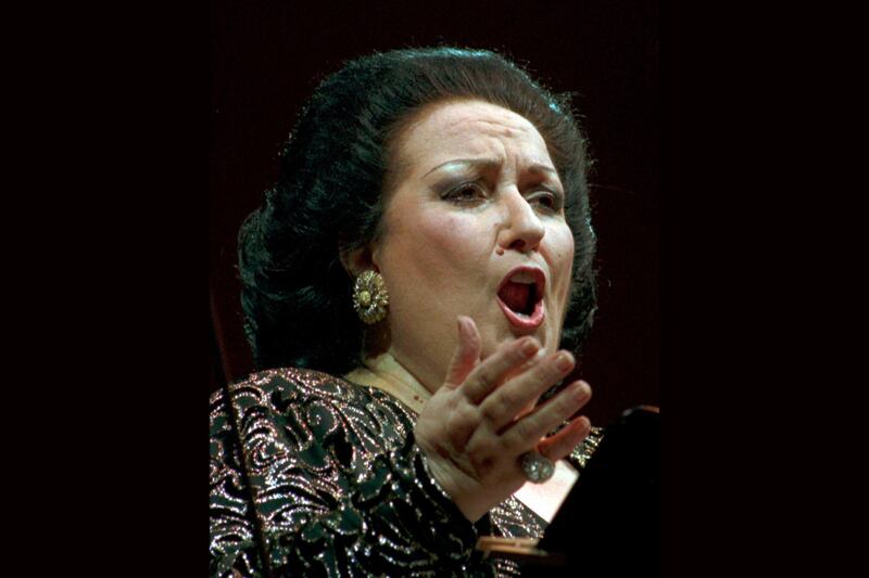 FILE - In this July 13, 1996 file photo, Montserrat Caballe during a concert in Dresden, Germany. Spanish opera diva Montserrat Caballe, renowned for her bel canto technique and her interpretations of the roles of Rossini, Bellini and Donizetti, has died. She was 85. Hospital Sant Pau press officer Abraham del Moral confirmed her passing away early on Saturday Oct. 6, 2018. (AP Photo/Matthias Rietschel, File)