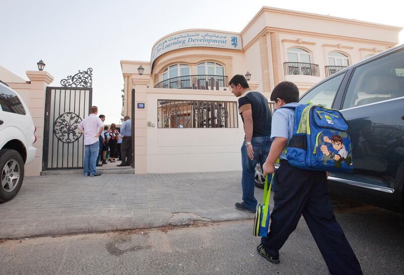 Dubai, United Arab Emirates, Sep 09, 2012 -  Students and parents arrive at St Andrews School in in Al Safa.  The group Dubai Education has said they will now take over the management of the school. ( Jaime Puebla / The National Newspaper )
