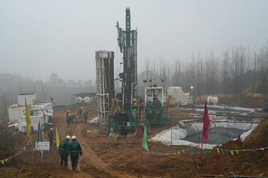 Greka workers are seen at a coalbed methane drilling site in Shanxi province, China. Reuters