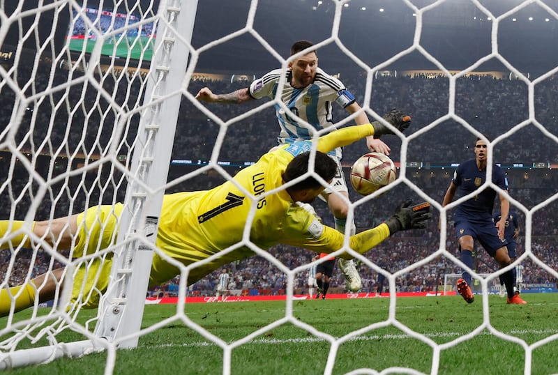 Lionel Messi scores Argentina's third goal. Reuters