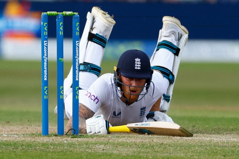 England's Ben Stokes dives and narrowly avoids a run out. Reuters