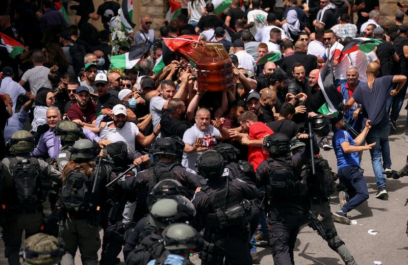 Family and friends carry the coffin of reporter Shireen Abu Akleh, who was shot during an Israeli raid in Jenin in the occupied West Bank, on May 13. Reuters