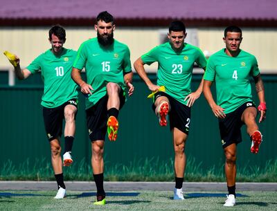 L to R, Australia's forward Robbie Kruse, Australia's midfielder Mile Jedinak, Australia's midfielder Tomas Rogic and Australia's forward Tim Cahill attend a training session at the Park Arena in Sochi on June 25, 2018, on the eve of the Russia 2018 FIFA World Cup Group C football match between Australia and Peru. / AFP / Nelson Almeida
