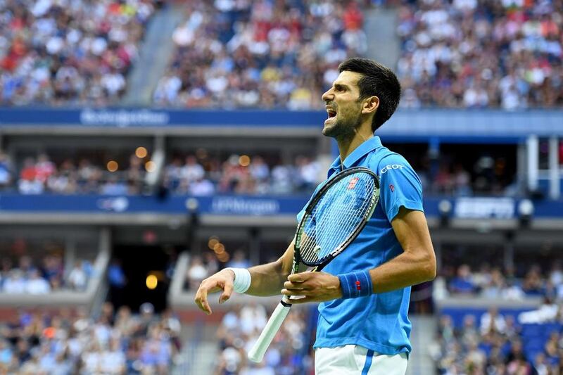 Novak Djokovic of Serbia reacts against Stan Wawrinka of Switzerland. Alex Goodlett / Getty Images