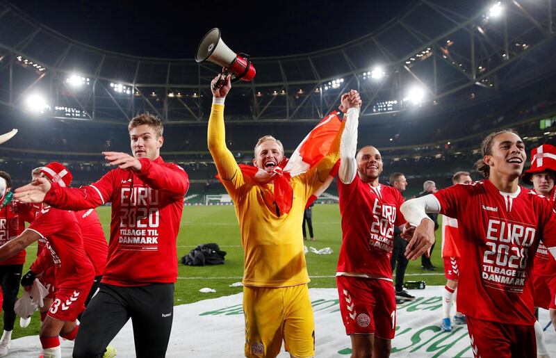 Denmark's Kasper Schmeichel celebrates with Martin Braithwaite and teammates. Reuters