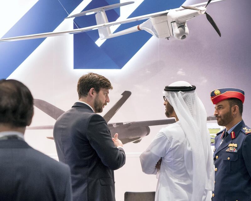 ABU DHABI, UNITED ARAB EMIRATES - February 27, 2018: HH Sheikh Mohamed bin Zayed Al Nahyan, Crown Prince of Abu Dhabi and Deputy Supreme Commander of the UAE Armed Forces (center R), visits the WB Group booth while visiting the Unmanned Systems Exhibtion and Conference (UMEX) 2018 at the Abu Dhabi National Exhibition Centre (ADNEC). 
( Ryan Carter for the Crown Prince Court - Abu Dhabi )
---