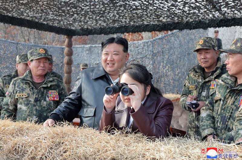 North Korean leader Kim Jong Un and his daughter Ju Ae inspect the Korean People's Army in training at an undisclosed location in the country. AFP