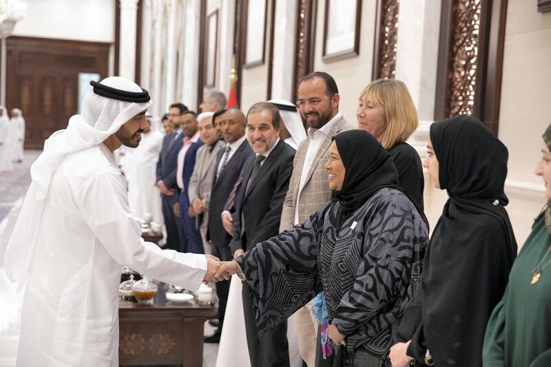 ABU DHABI, UNITED ARAB EMIRATES - May 14, 2019: HH Sheikh Abdullah bin Zayed Al Nahyan, UAE Minister of Foreign Affairs and International Cooperation (L), greets a doctor who volunteered at the Special Olympics World Games Abu Dhabi 2019, during an after reception at Al Bateen Palace. 

( Hamad Al Mansouri for the Ministry of Presidential Affairs )​
---