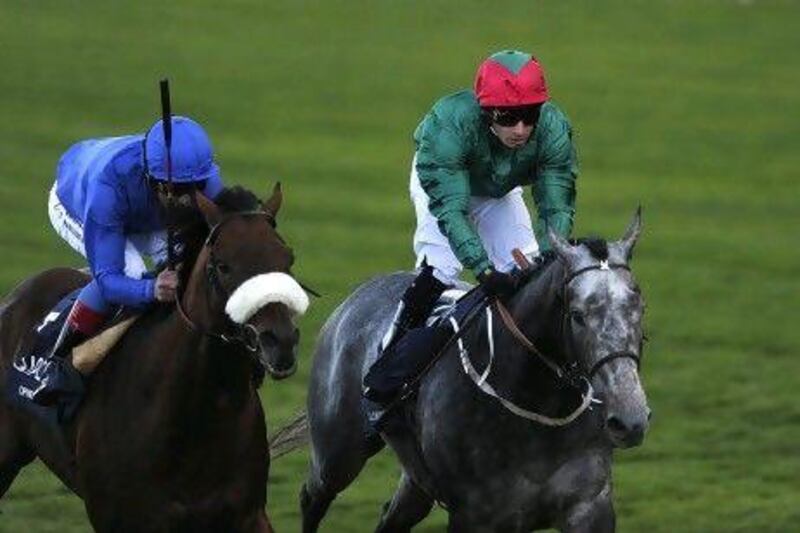 Frankie Dettori was aboard Opinion Poll, left, while Silvestre De Sousa rode Colour Vision, right, to third place in the Long Distance Cup in October.