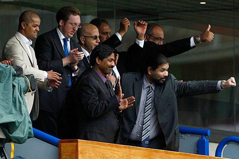 The 4-3 victory over Arsenal delighted Venky's, the Blackburn Rovers owners, whose thumbs up here might be directed towards manager Steve Keen whose job is in doubt at the club.

Tim Hales / AP Photo