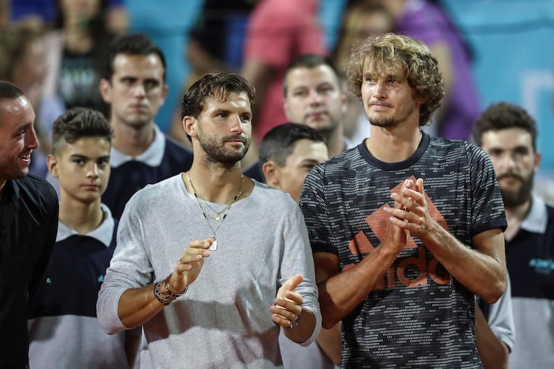 Bulgaria's Grigor Dimitov and Germany's Alexander Zverev are seen during the trophy ceremony during Adria Tour at Novak Tennis Centre in Belgrade, Serbia, June 14, 2020. Picture taken June 14, 2020. REUTERS/Marko Djurica