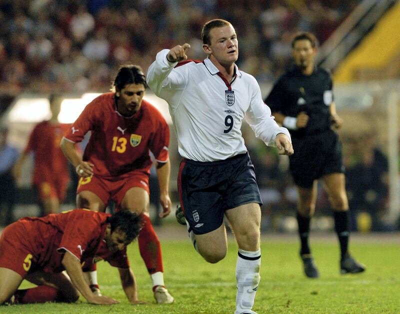 Wayne Rooney (C) from Enlgland celebrates his goal against Macedonia during their Euro 2004 Qualifying match at the City stadium in Skopje,on 06 September, 2003.     AFP PHOTO DIMITAR DILKOFF / AFP PHOTO / DIMITAR DILKOFF